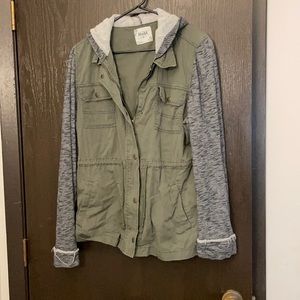 Light weight dark green SO jacket, in okay condition.